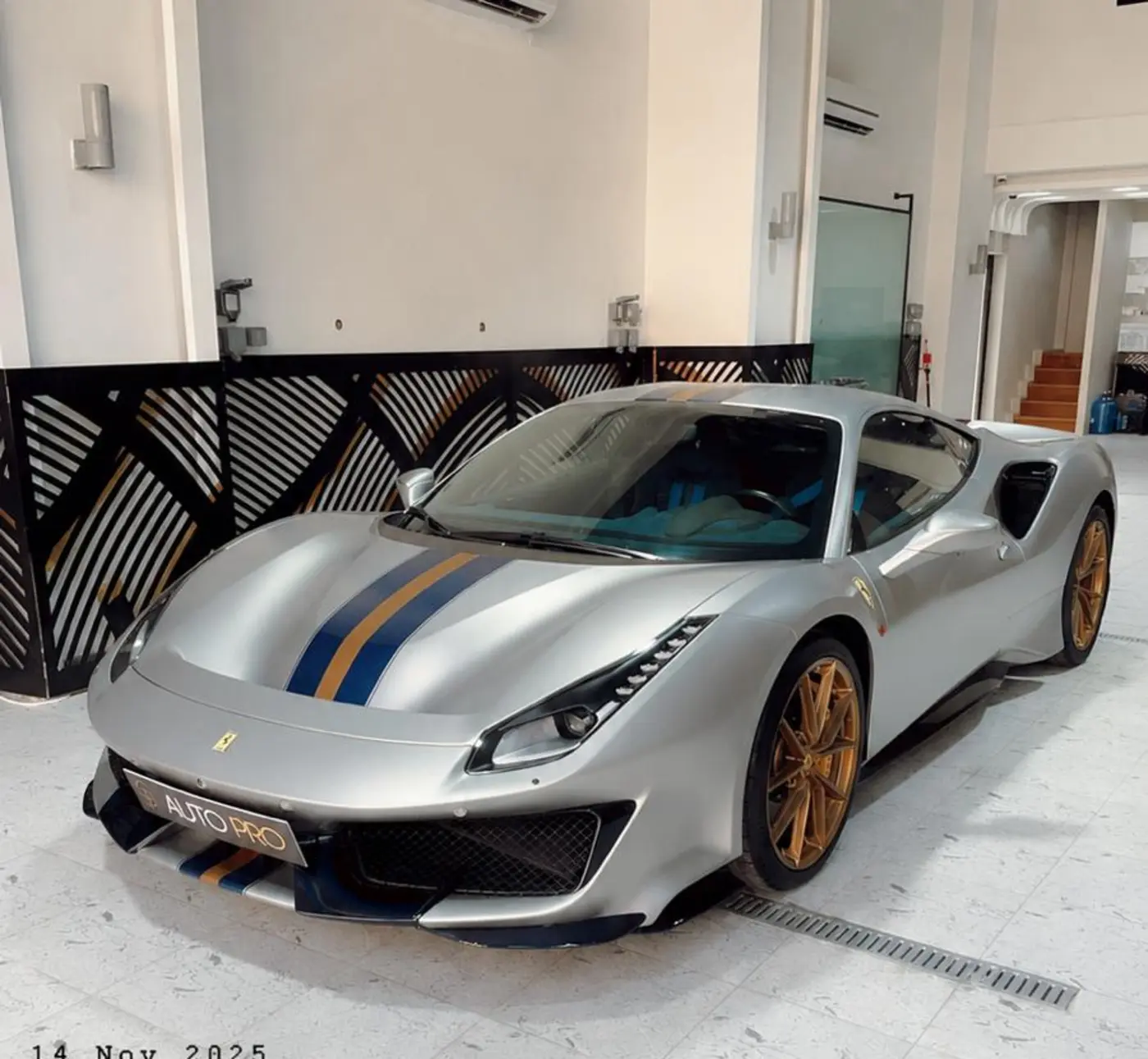 Silver Ferrari at AUTO PRO