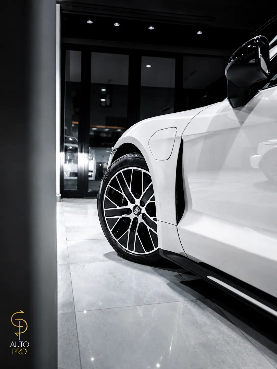 Glossy white Porsche treated with nano ceramic at AUTO PRO
